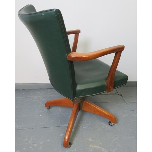 746 - A vintage medium oak ‘Hillcrest’ desk chair, with tilt and swivel mechanism, on castors. 
Condition ... 