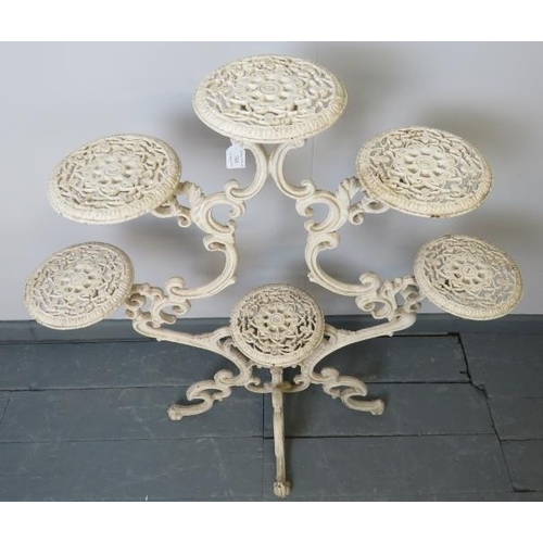 748 - A 19th century cast iron plant stand in the manner of Coalbrookdale, with capacity for 6 pots, on or... 