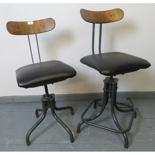 750 - A near pair of vintage C&N model 1940s industrial machinist’s stools, with adjustable plywood backre... 