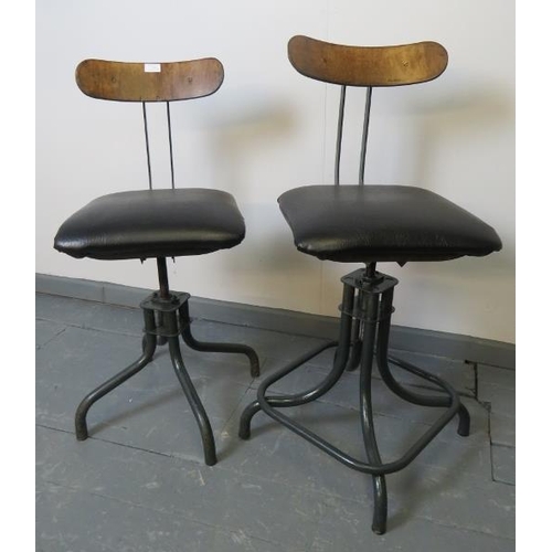 750 - A near pair of vintage C&N model 1940s industrial machinist’s stools, with adjustable plywood backre... 