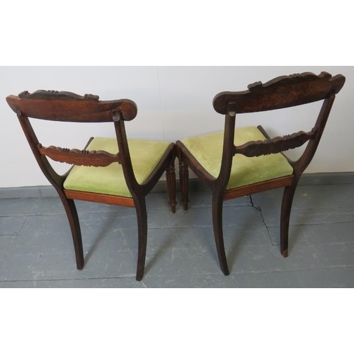 758 - A pair of William IV rosewood occasional chairs with green velvet drop-in seat pads and featuring or... 