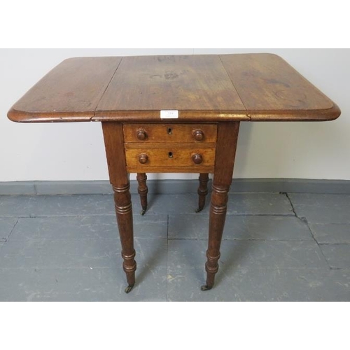 759 - An early Victorian mahogany drop leaf work table, with two short drawers to one side and two dummy d... 