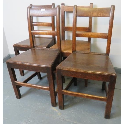 766 - A set of four Georgian country made oak kitchen chairs, on square supports with stretchers. 
Conditi... 