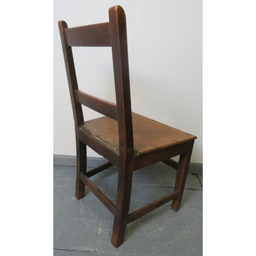 769 - A Georgian country made oak occasional chair, on square supports with stretchers.
Condition report: ... 