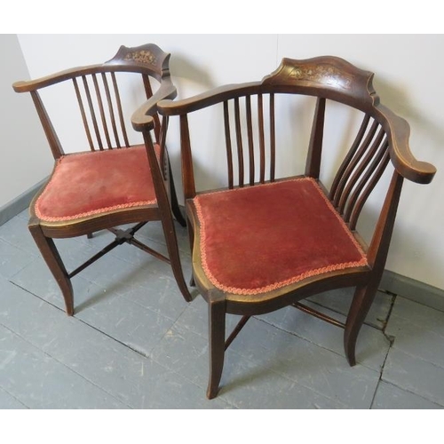 770 - A pair of Edwardian mahogany corner chairs, with marquetry inlay and strung with satinwood, upholste... 