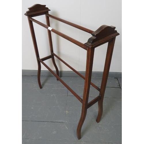 774 - An Edwardian mahogany double towel rail strung with satinwood. 
Condition report: Slight movement to... 