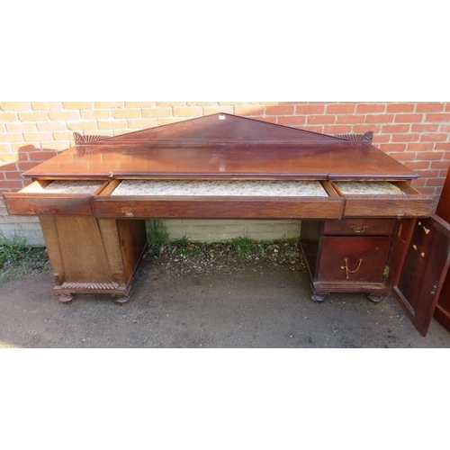 780 - A very large 19th century mahogany twin pedestal buffet sideboard, of three blind frieze drawers, fe... 