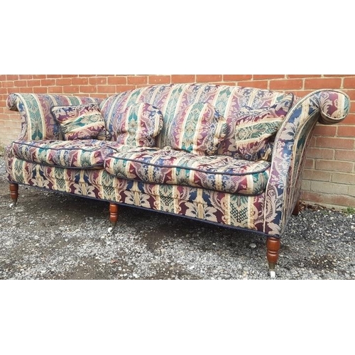 788 - A large 19th century style two-seater sofa, with scrolled arms, raised on three tapered turned front... 