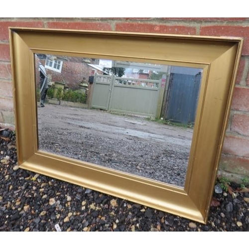 790 - A bevelled rectangular wall mirror in moulded gilt gesso frame. 
Condition report: Some losses to fr... 