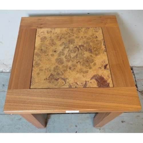 793 - A contemporary blonde hardwood square occasional table, with inset burrwood panel, on square support... 