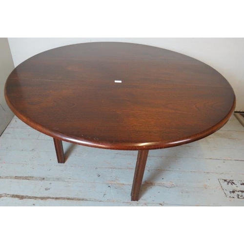 794 - A Georgian style mahogany circular dropleaf dining table, raised on shaped square supports.
Conditio... 