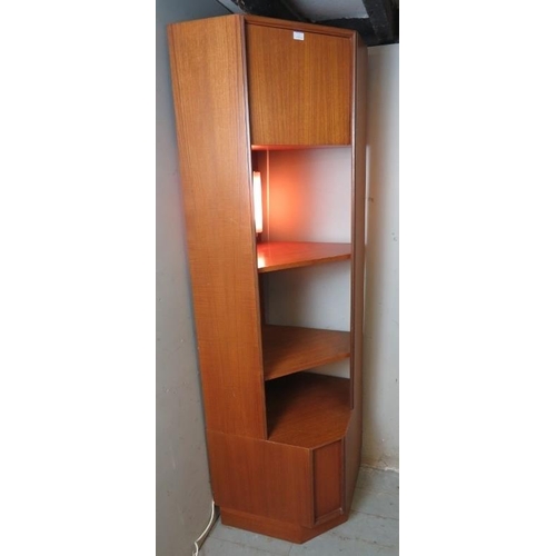 796 - A mid-century teak freestanding G Plan Form 5 corner cupboard of blind top cupboard and two open she... 