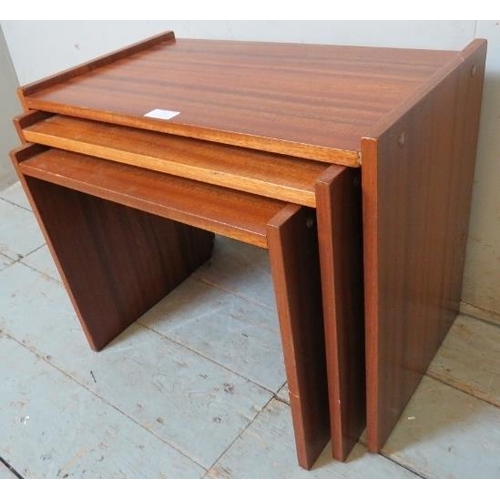 798 - A set of three mid-century teak nesting tables. 
Condition report: Minor marks consistent with age.
... 