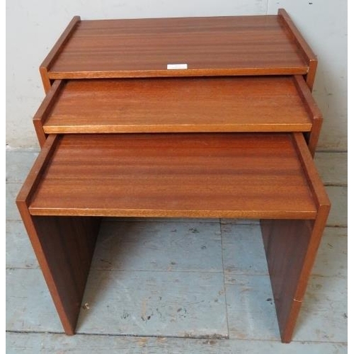 798 - A set of three mid-century teak nesting tables. 
Condition report: Minor marks consistent with age.
... 