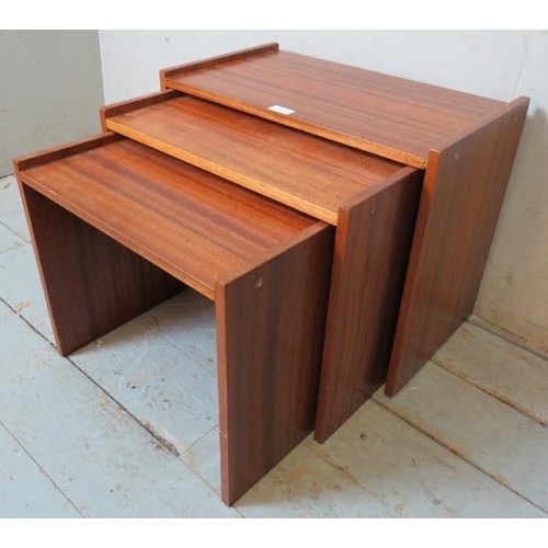 798 - A set of three mid-century teak nesting tables. 
Condition report: Minor marks consistent with age.
... 