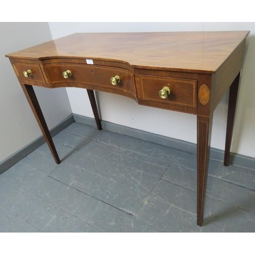 812 - A Regency mahogany writing desk, of three drawers, strung with satinwood and boxwood, featuring shel... 