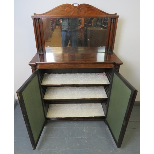 815 - A Regency rosewood mirror back chiffonier, with scrolled cornice and half- columns to either side, t... 