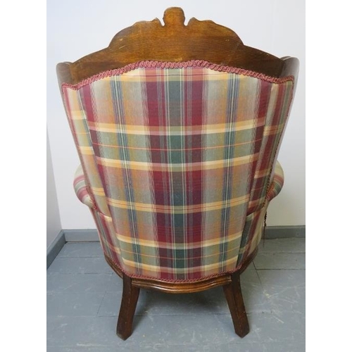 821 - A pair of Victorian style show-wood armchairs with scrolled arms, upholstered in a tartan material, ... 