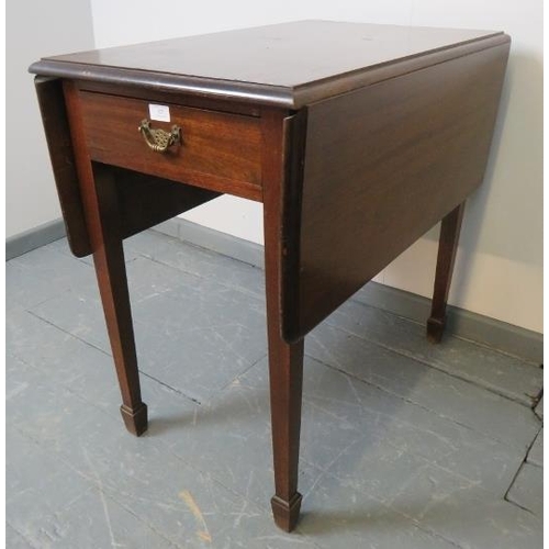 825 - An Edwardian mahogany Pembroke table with single drawer, on tapering square supports with spade feet... 