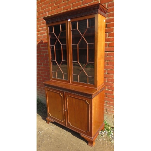 829 - An Edwardian mahogany display bookcase, with dentil cornice and blind fret frieze, the two astral gl... 