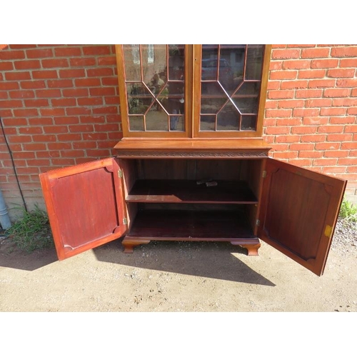 829 - An Edwardian mahogany display bookcase, with dentil cornice and blind fret frieze, the two astral gl... 