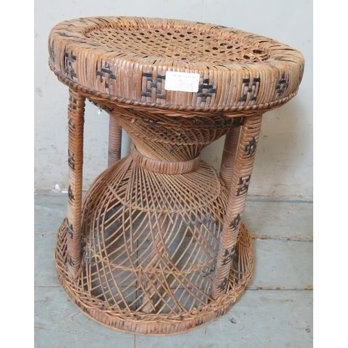 835 - A vintage wicker ‘peacock’ stool.
Condition report: Some damage to wickerwork.
H: 46cm Diameter: 39c... 