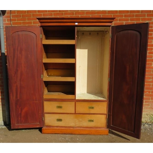 841 - A Victorian mahogany double wardrobe, the full-length doors opening onto a fitted interior with four... 