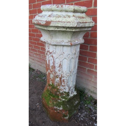 868 - A large octagonal nicely weathered Victorian terracotta chimney pot, with relief latticework decorat... 