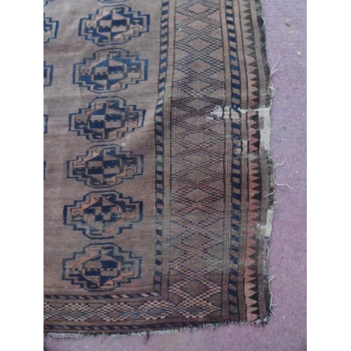 903 - An early 20th Century Persian rug, 235cm x 110cm. 
Condition report: Some wear and colour difference... 