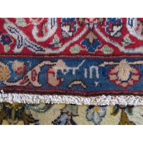 906 - A fantastic (signed) Birjand carpet with a central eight point flower motif and depicting birds. 3.7... 