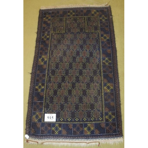 915 - Early-mid 20th Century Persian rug Belouch dark brown/blue grounds. 155cm x 90cm.
Condition report: ... 