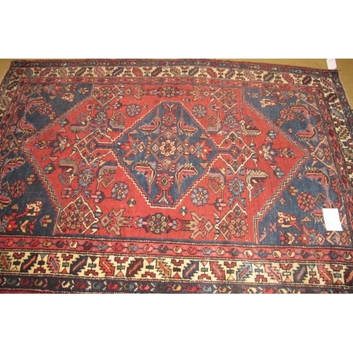 928 - A Persian Heriz rug, good size. 2.00 x 1.35
Condition report: Good condition and even colour.