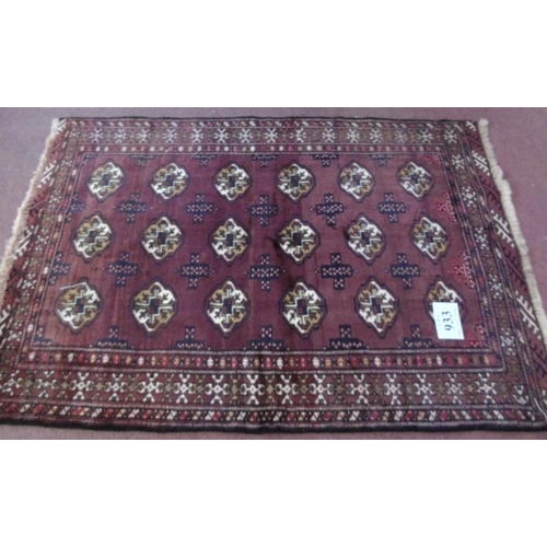 933 - A Persian Turkman rug on brown ground. 1.48x1.05.
Condition report: In good condition - slight colou... 