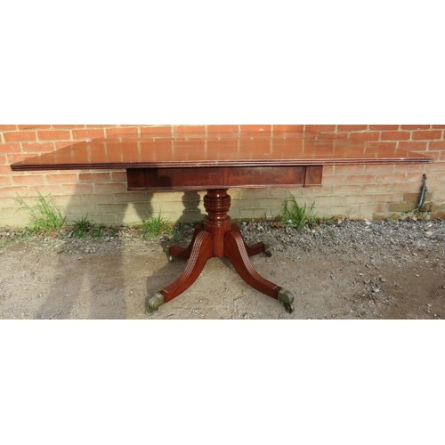 872 - A William IV Cuban mahogany tilt top square breakfast table, with reeded edge, on a turned pedestal ... 