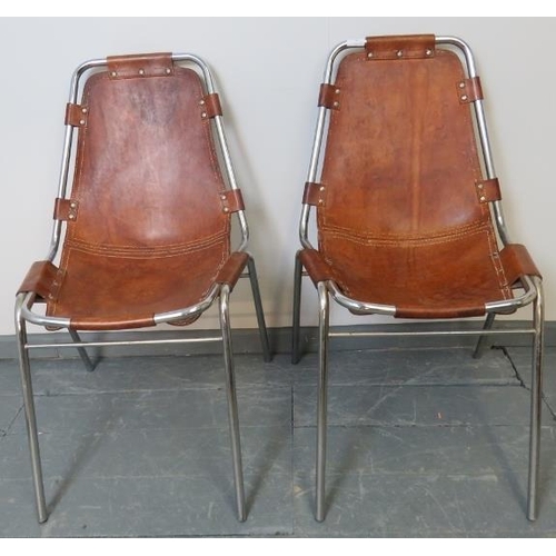 705 - A pair of 1960s ‘Les Arcs’ chairs by Charlotte Perriand, the saddle brown leather hand stitched seat... 