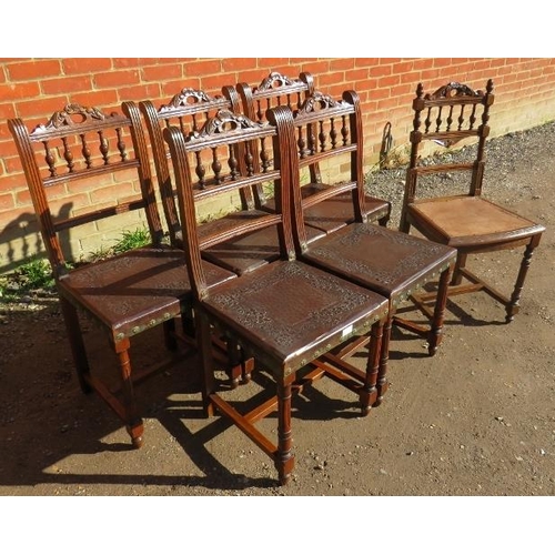 775 - Five Edwardian oak dining chairs with embossed leather seats, on reeded supports with stretchers, an... 