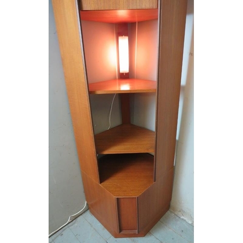 783 - A mid-century teak freestanding G Plan Form 5 corner cupboard of blind top cupboard and two open she... 