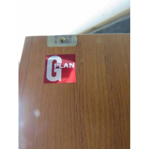 783 - A mid-century teak freestanding G Plan Form 5 corner cupboard of blind top cupboard and two open she... 