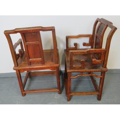 719 - A pair of Chinese Juzhou style jumu wood (southern elm) open sided armchairs with carved back panels... 