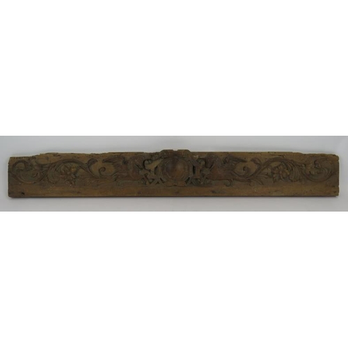 8 - A decorative 18th/19th century carved walnut frieze depicting a pair of unicorns around a central ca... 