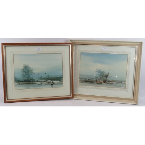 575 - British School (20th Century) - 'Lake Scenes with ducks in flight', a pair, watercolours, one signed... 