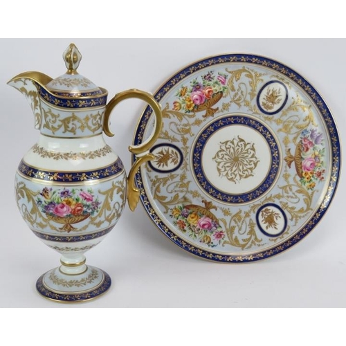 110 - A 19th century Sevres porcelain jug and stand with gilt and floral decoration, both pieces marked to... 