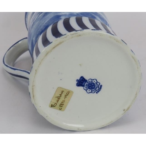 117 - A late 19th century Doulton Burslem flow blue jug with pastoral windmill scene. Height 19cm.
Conditi... 