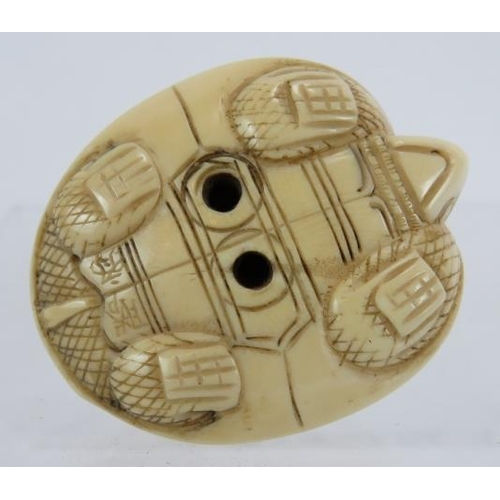 21 - A Japanese carved ivory Netsuke of a turtle and Cobra, early 20th century.  Height:2.8cm. Signed to ... 