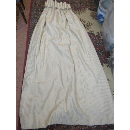 220 - Two pairs of ivory ruched silk curtains with rope twist pleated headers, fully lined. Each curtain d... 