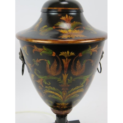 221 - A contemporary Regency Toleware style lamp base with hand decorated foliate design. Height 48cm.
Con... 