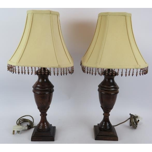 222 - A pair of contemporary baluster urn lamps with burnished bronze finish and square beaded shades. Ove... 