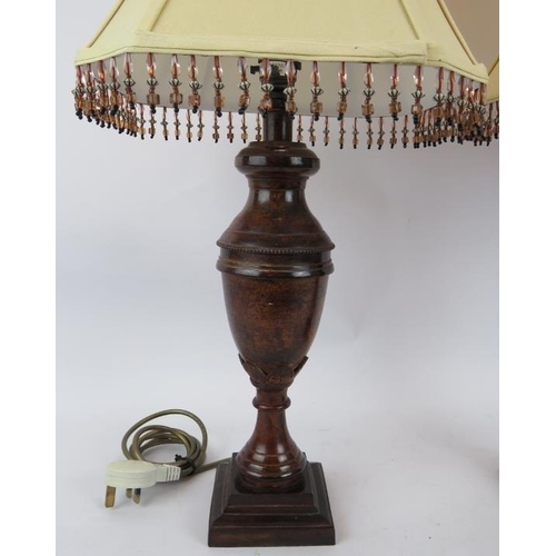 222 - A pair of contemporary baluster urn lamps with burnished bronze finish and square beaded shades. Ove... 