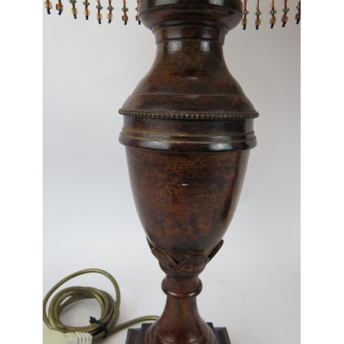 222 - A pair of contemporary baluster urn lamps with burnished bronze finish and square beaded shades. Ove... 