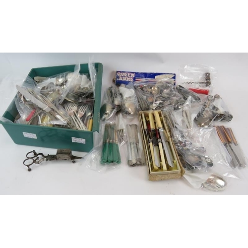 225 - A large selection of silver plated and steel cutlery and accessories including caddy spoons, sugar t... 